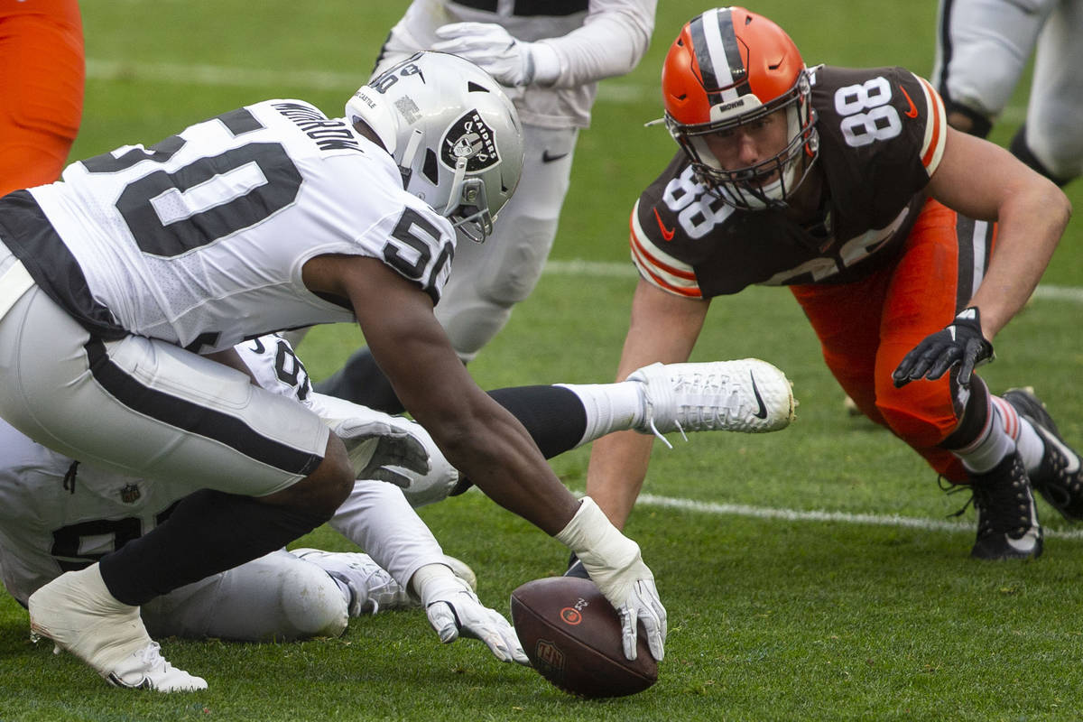 Las Vegas Raiders linebacker Nicholas Morrow (50) reaches to recover a fumble made by Cleveland ...