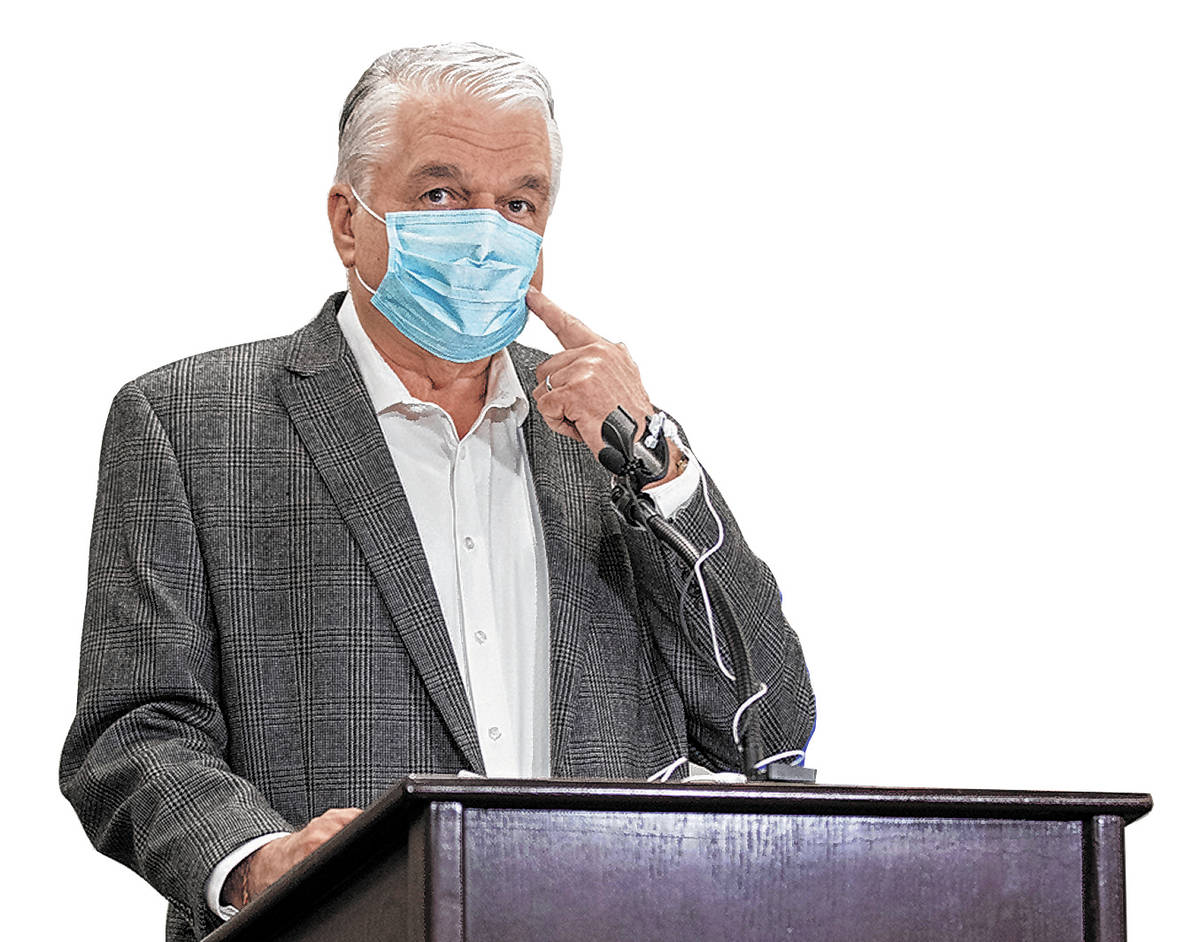 Gov. Steve Sisolak discusses Nevada’s recent COVID-19 figures during a press conference ...