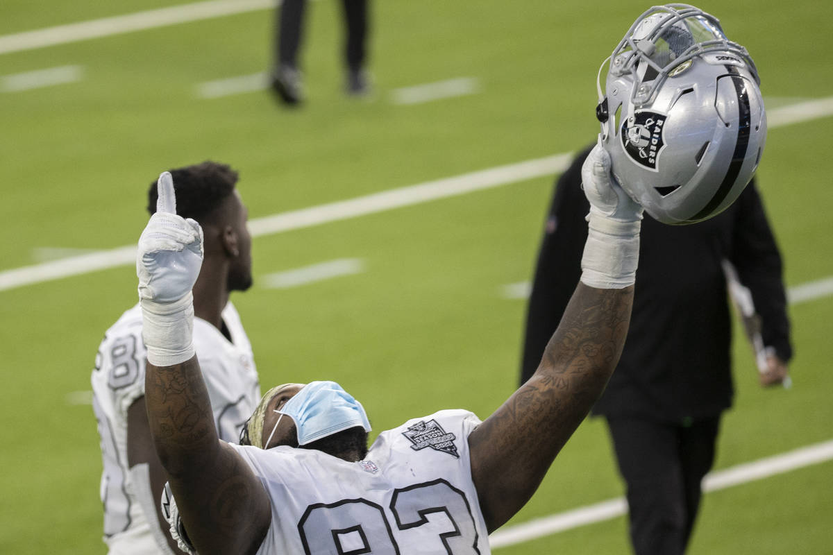 Las Vegas Raiders defensive tackle Daniel Ross (93) celebrates after defeating the Los Angeles ...