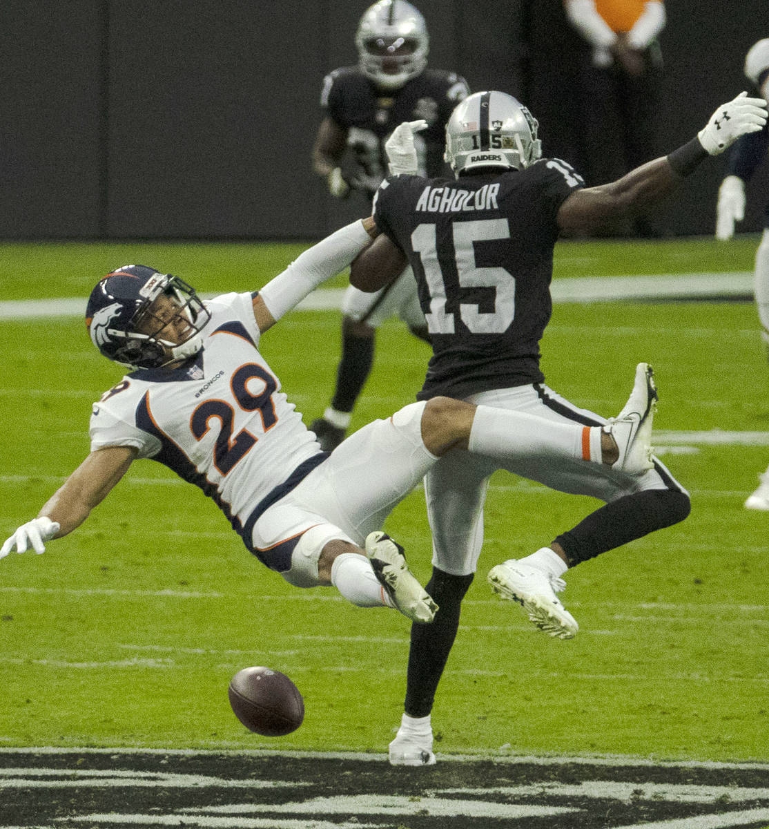 Denver Broncos cornerback Bryce Callahan (29) is unable to catch the ball as Las Vegas Raiders ...