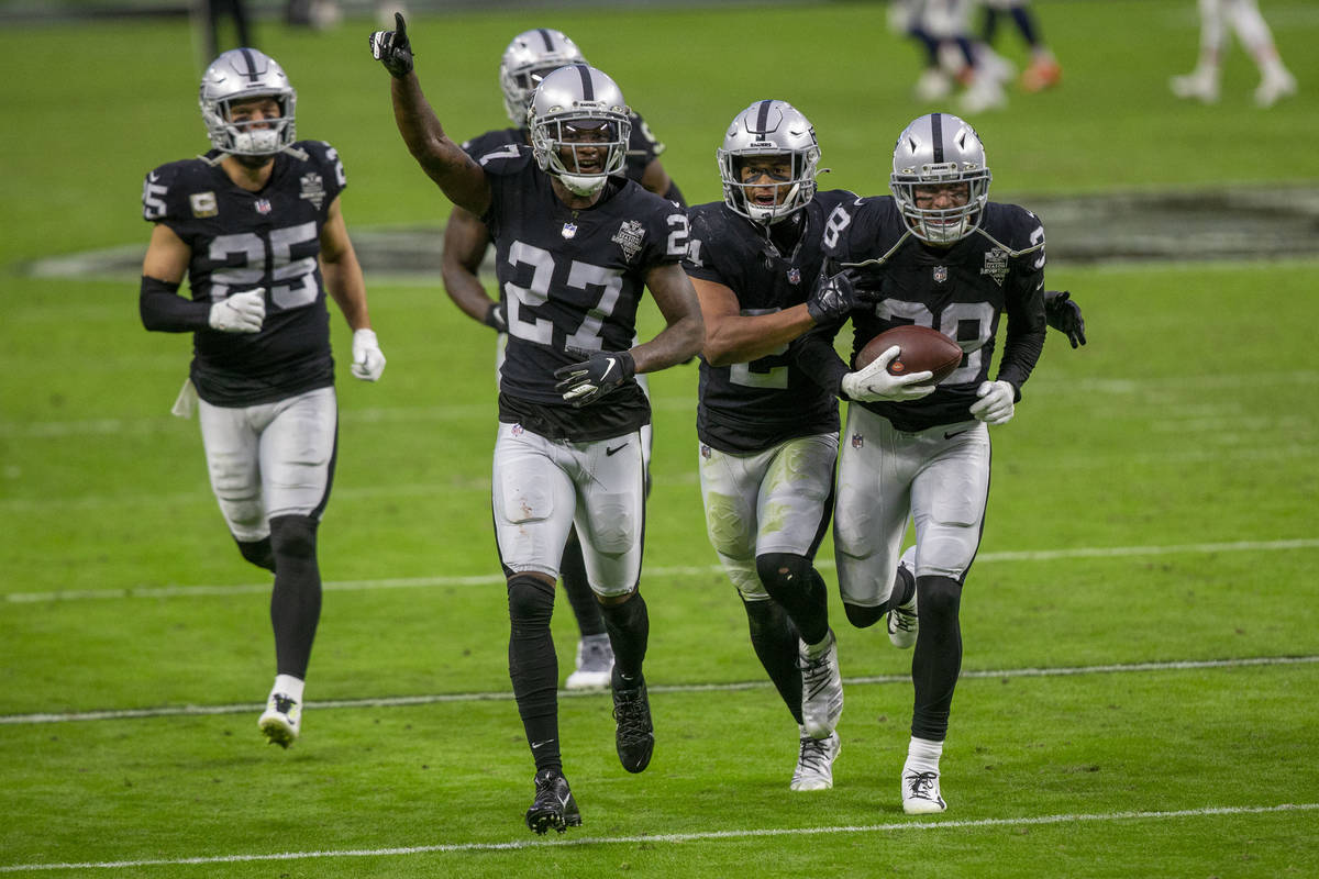 Las Vegas Raiders strong safety Jeff Heath (38) celebrates his interception of Denver Broncos q ...