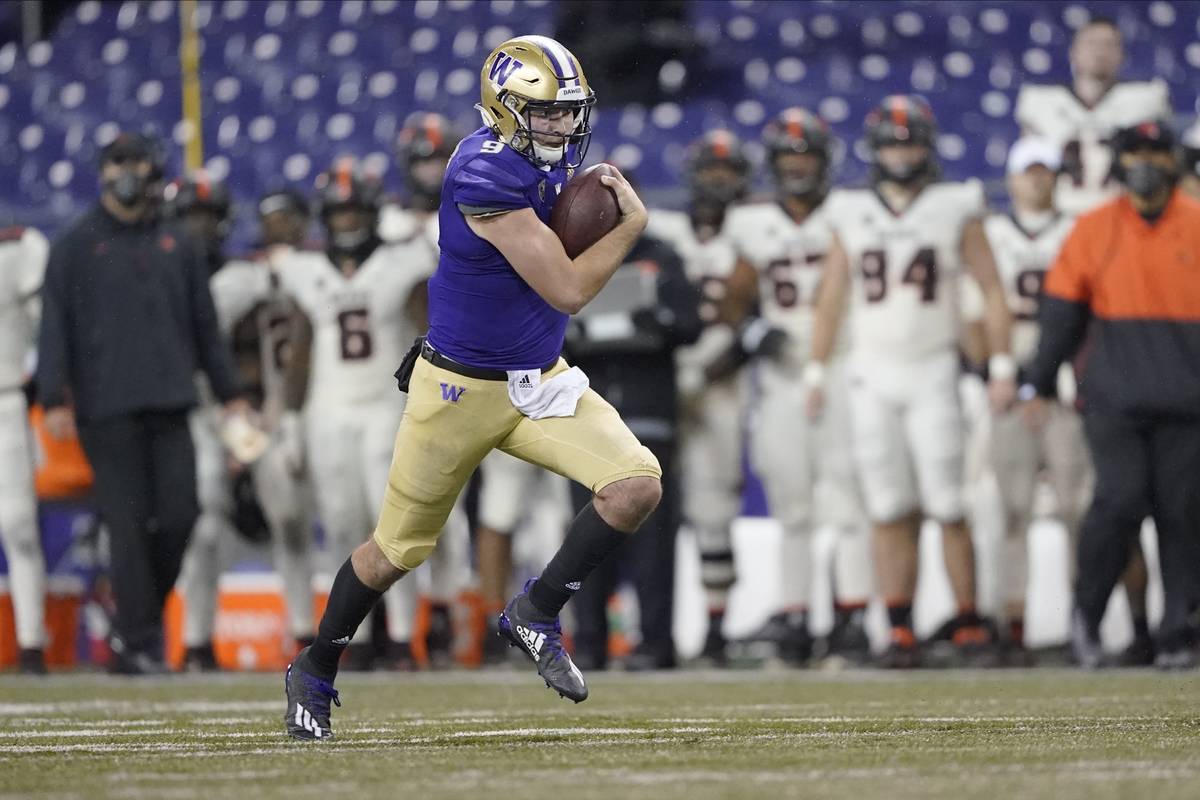 Washington quarterback Dylan Morris in action against Oregon State during an NCAA college footb ...