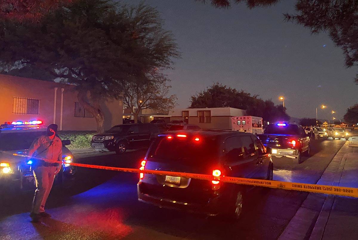 Las Vegas police at the scene of a homicide near East Tropicana Avenue and South Pecos Road on ...