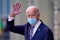 President-elect Joe Biden wavs as he leaves The Queen theater, Tuesday, Nov. 10, 2020, in Wilmi ...