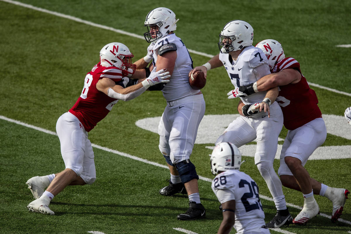 Nebraska's Ben Stille sacks Penn State's Will Levis late in the fourth quarter of an NCAA colle ...