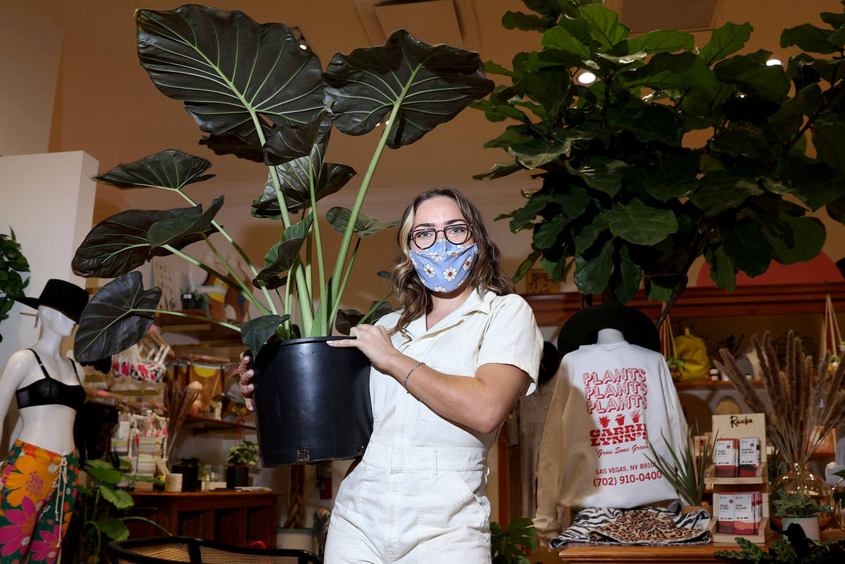 Brooklyn Martell, owner of Carrie Lynn’s plant shop in Downtown Summerlin, poses for a portra ...