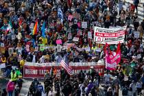 People celebrate the victory of President-elect Joe Biden and Vice President-elect Kamala Harri ...