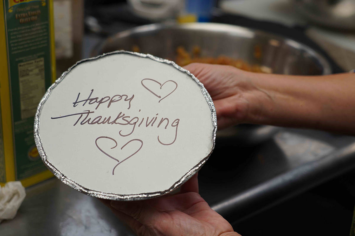 Volunteers prepare individual Thanksgiving meals for seniors in Hawthorne, N.J., on Nov. 3, 202 ...