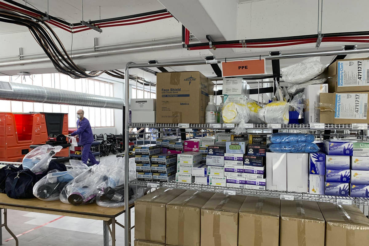 Personal protective equipment (PPE) is stacked inside Renown Regional Medical Center's parking ...