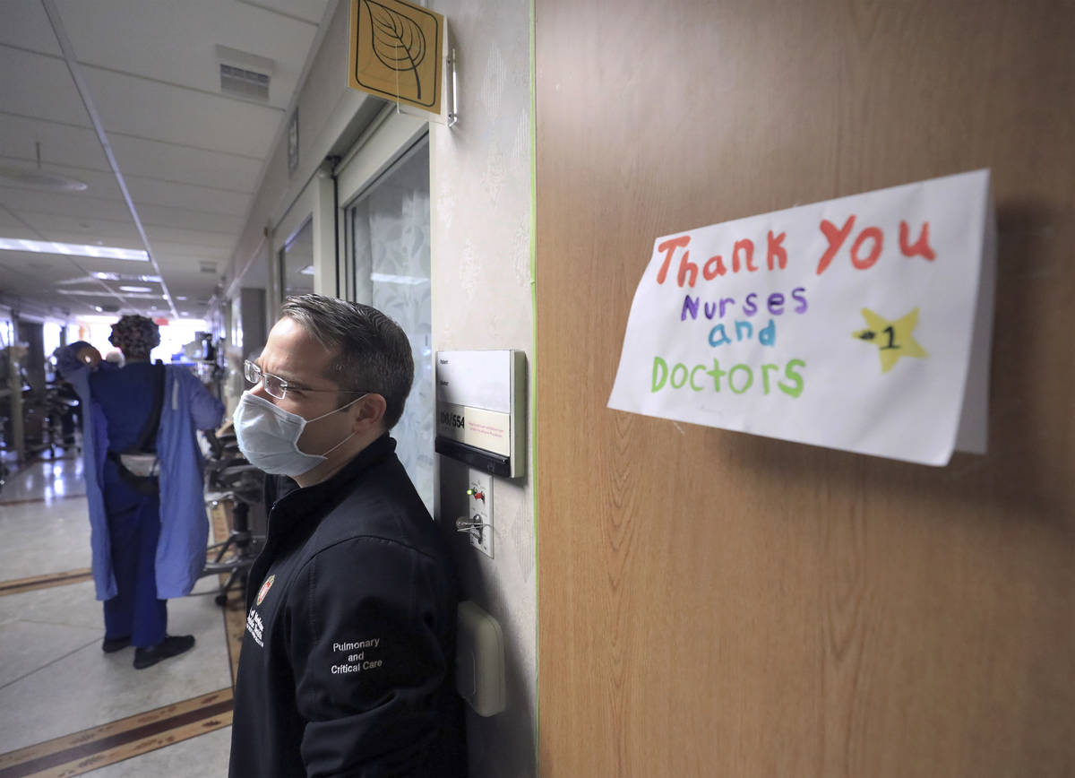 In this Nov. 5, 2020, file photo, a thank you note for staff at UW Health is displayed on a wal ...