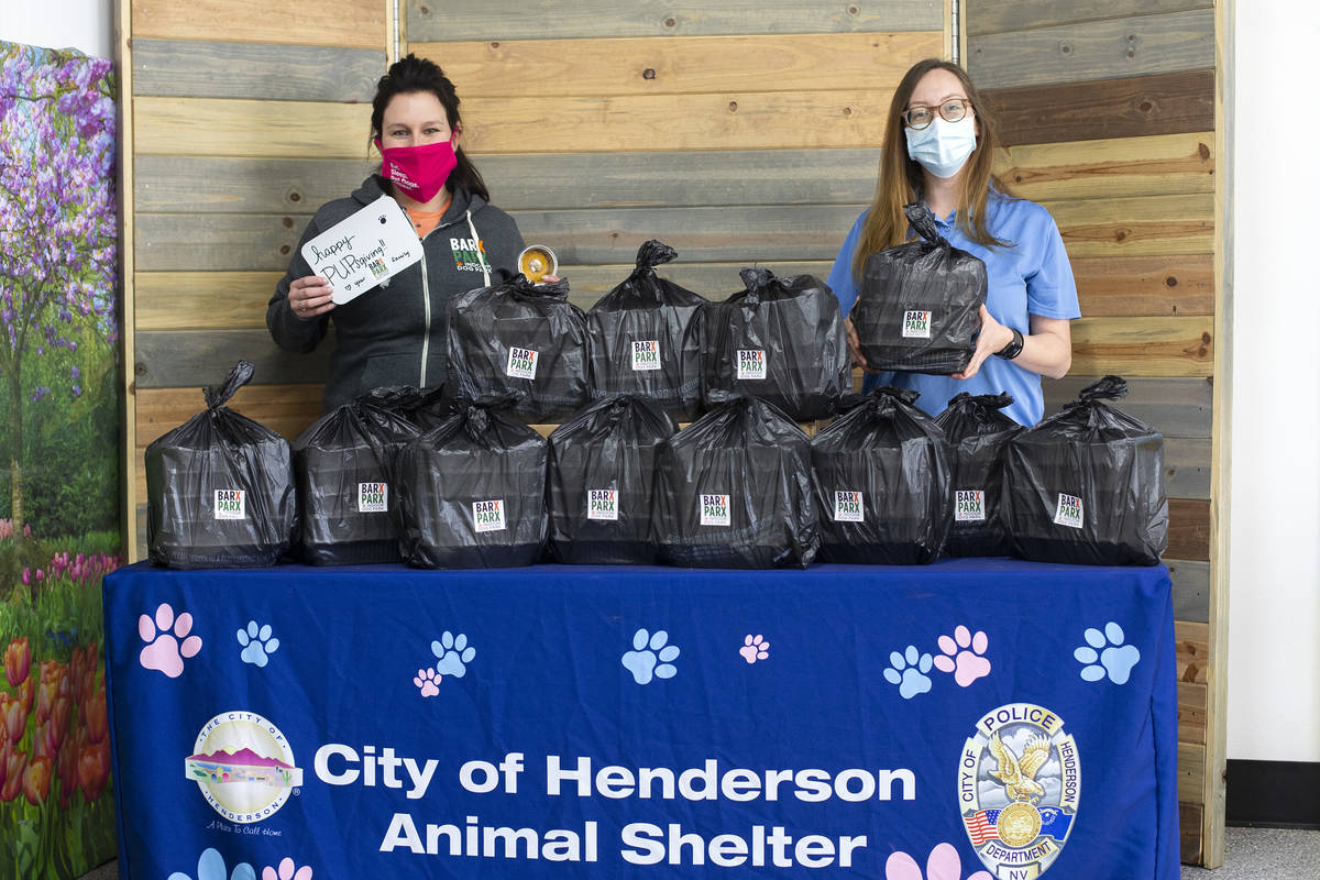 Jen Freet, owner of Barx Parx, left, and Kianna Dombrowski, kennel attendant at the Henderson A ...