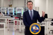 California Gov. Gavin Newsom speaks at a COVID-19 testing facility in Valencia, Calif., in Octo ...