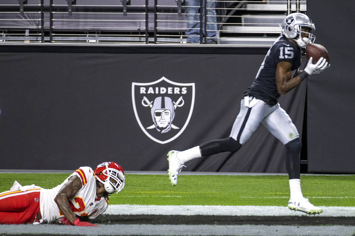 Las Vegas Raiders wide receiver Nelson Agholor (15) secures a touchdown catch as Kansas City Ch ...