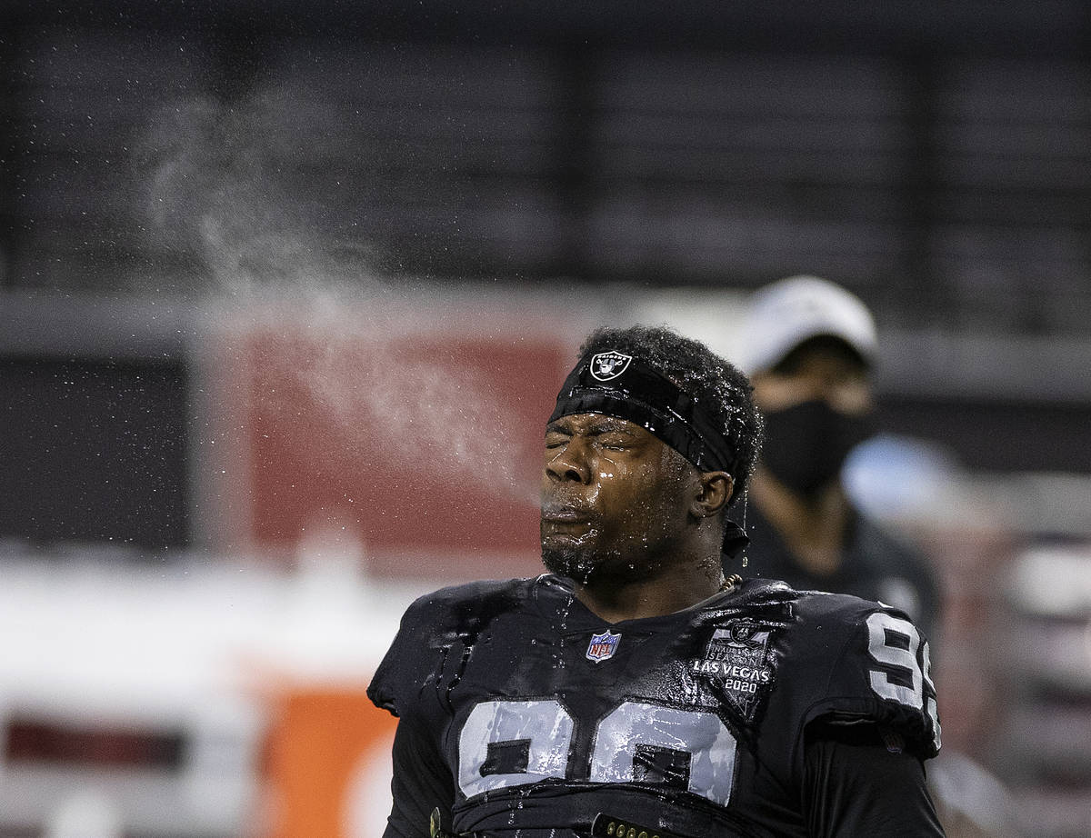 Las Vegas Raiders defensive end Arden Key (99) warms up before the start of an NFL football gam ...