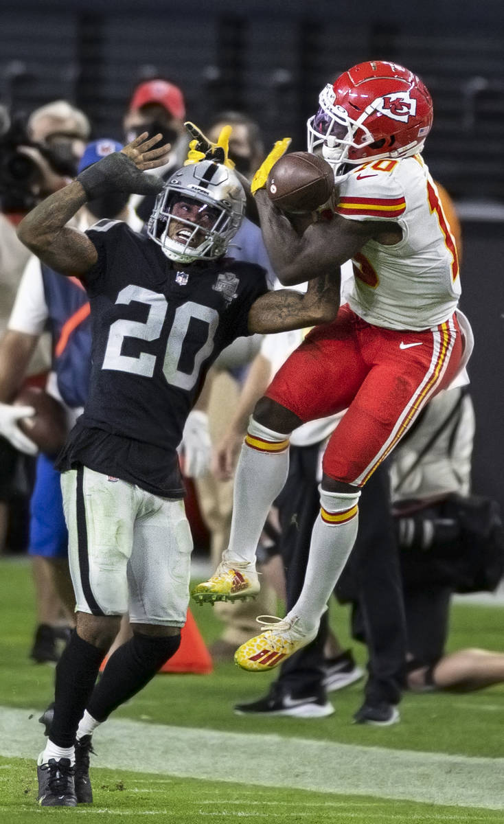 Kansas City Chiefs wide receiver Tyreek Hill (10) leaps to try and bring in a catch over Las Ve ...