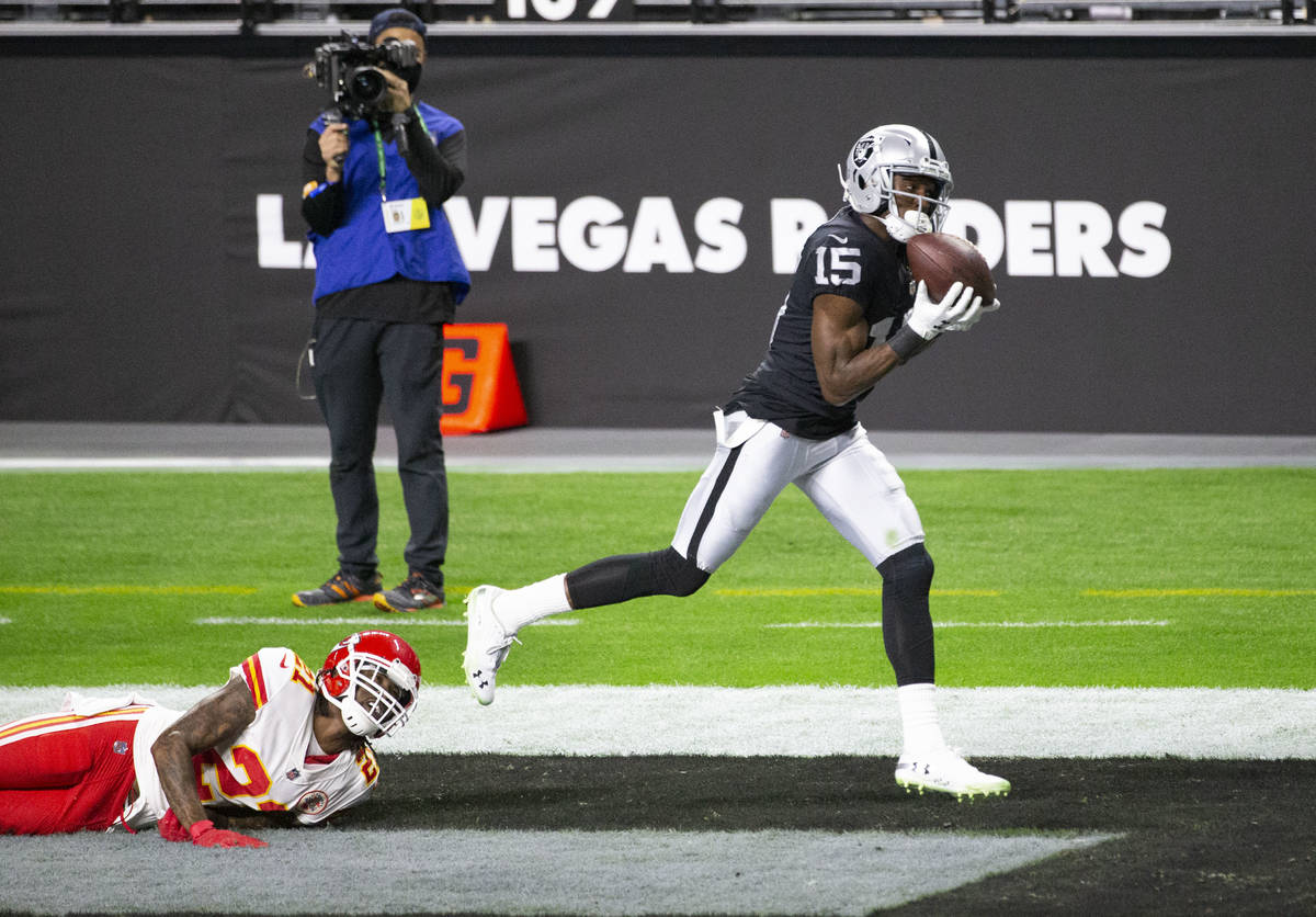 Las Vegas Raiders wide receiver Nelson Agholor (15) scores a touchdown as Kansas City Chiefs co ...