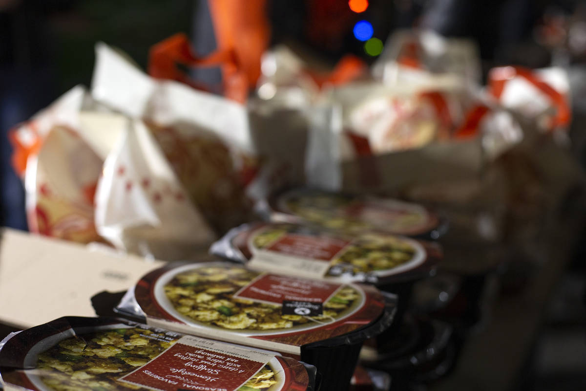Holiday food items await delivery to families in need during Hope for the City's drive-through ...