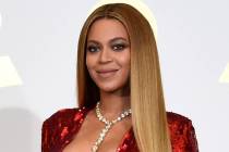 In this Feb. 12, 2017, file photo, Beyonce poses in the press room at the 59th annual Grammy Aw ...