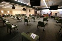 A social distancing seating arrangement at the Regional Justice Center jury services room is se ...