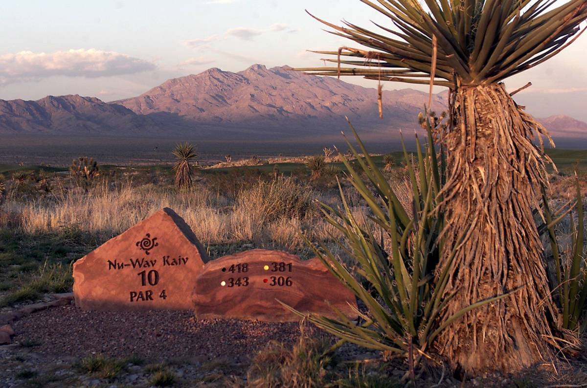 Sun sets on the native plants, rocks and soil on the 10th hole of Las Vegas Paiute Golf Resort' ...