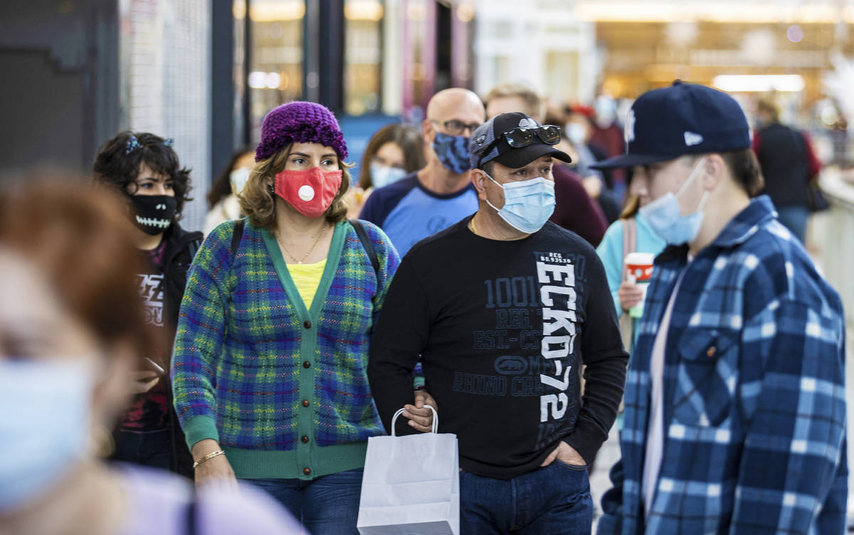 Shoppers search for Black Friday deals at Galleria at Sunset on Friday, Nov. 27, 2020, in Hende ...