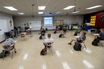 In this Sept. 24, 2020, file photos, students keep socially distanced while attending Joel Arno ...