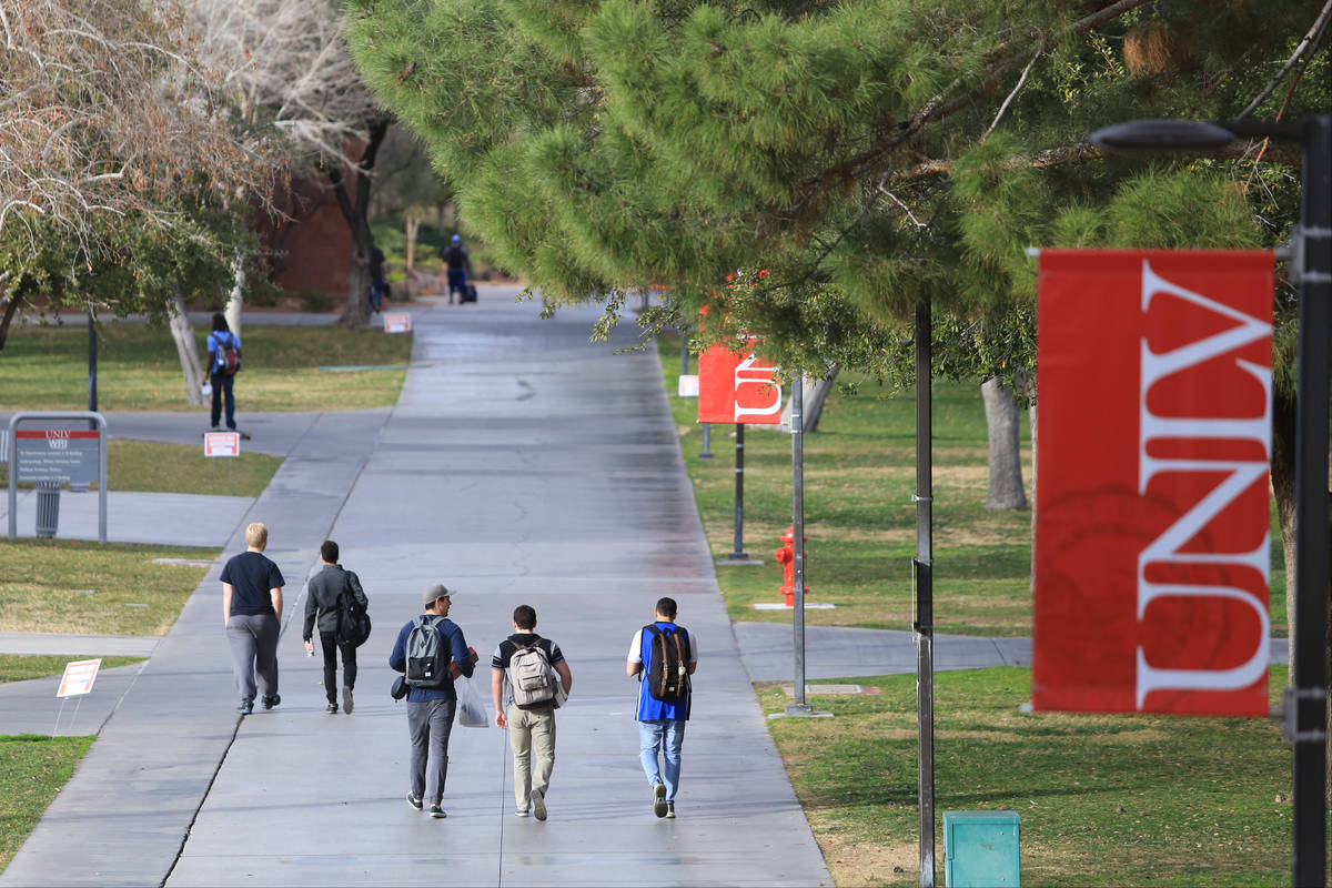 Students walk along a sidewalk at UNLV in this Feb. 9, 2017, file photo. (Las Vegas Review-Journal)