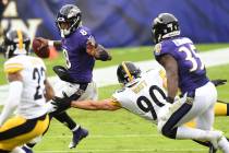 Baltimore Ravens quarterback Lamar Jackson (8) runs the ball against Pittsburgh Steelers outsid ...