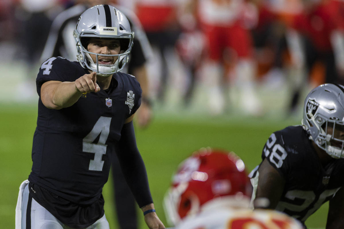 Las Vegas Raiders quarterback Derek Carr (4) calls an audible in the third quarter during an NF ...