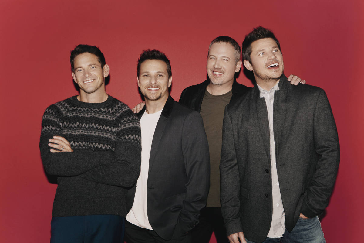 Member of 98 Degrees are shown, from left: Jeff Timmons, Drew Lachey,  Justin Jeffre and Nick La …