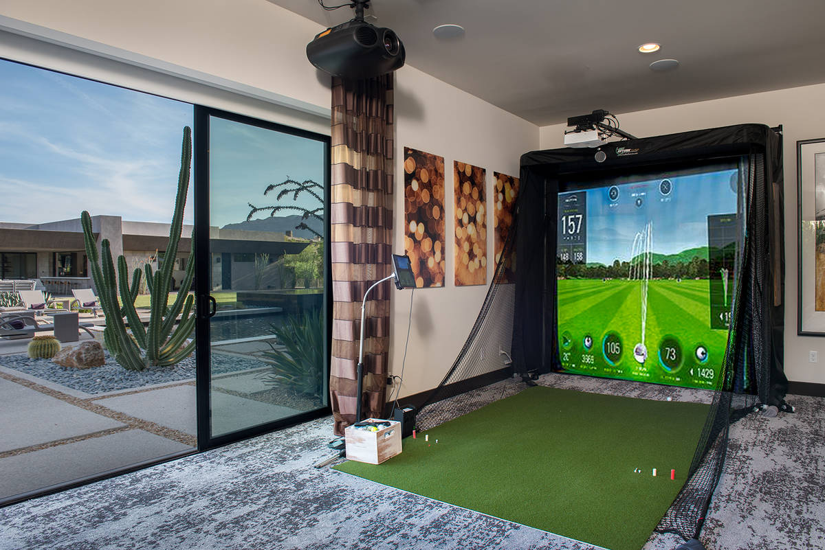 The home has lots of entertainment features, including this virtual golf area. (Simply Vegas)