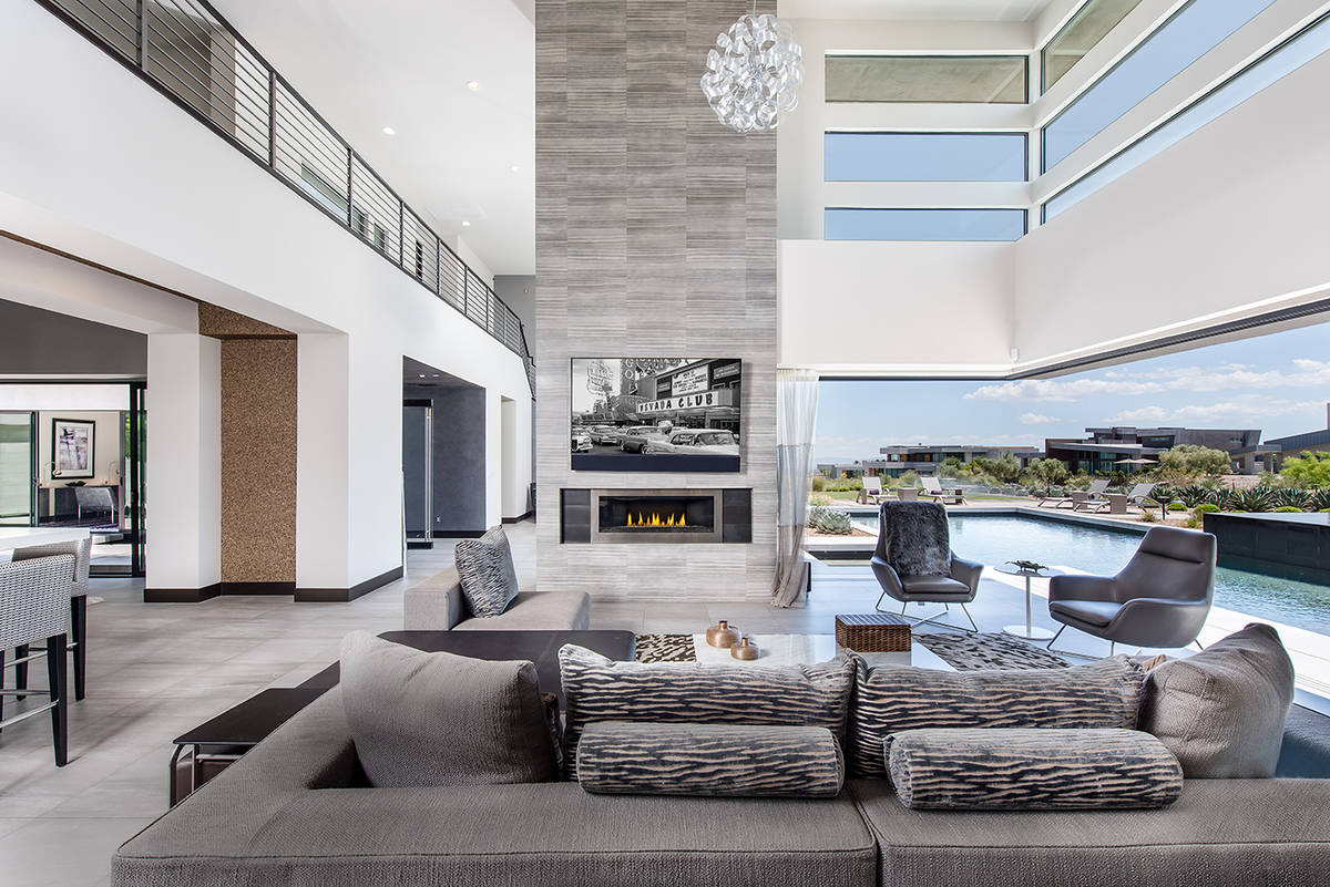 There are five bedrooms in the main house that measures about 7,000 square feet, and there are ...
