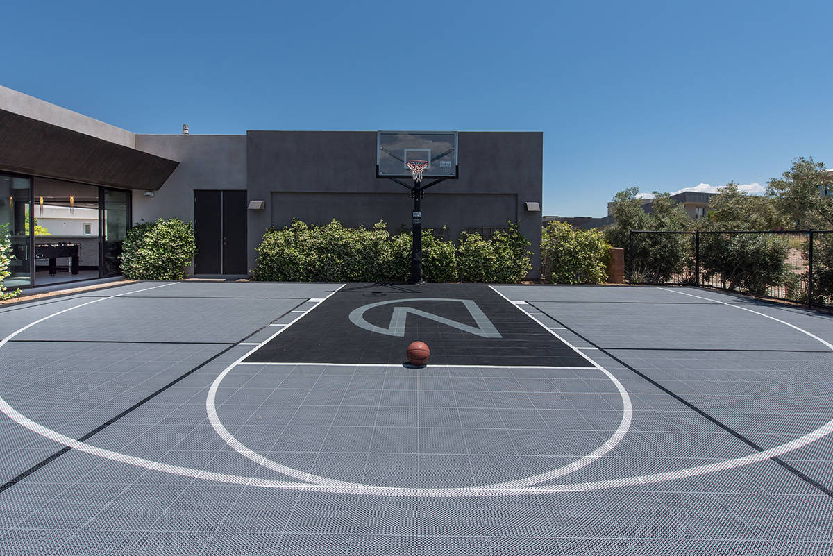Las Vegas injury law attorney Farhan Naqvi built an outdoor basketball court for his home in Th ...