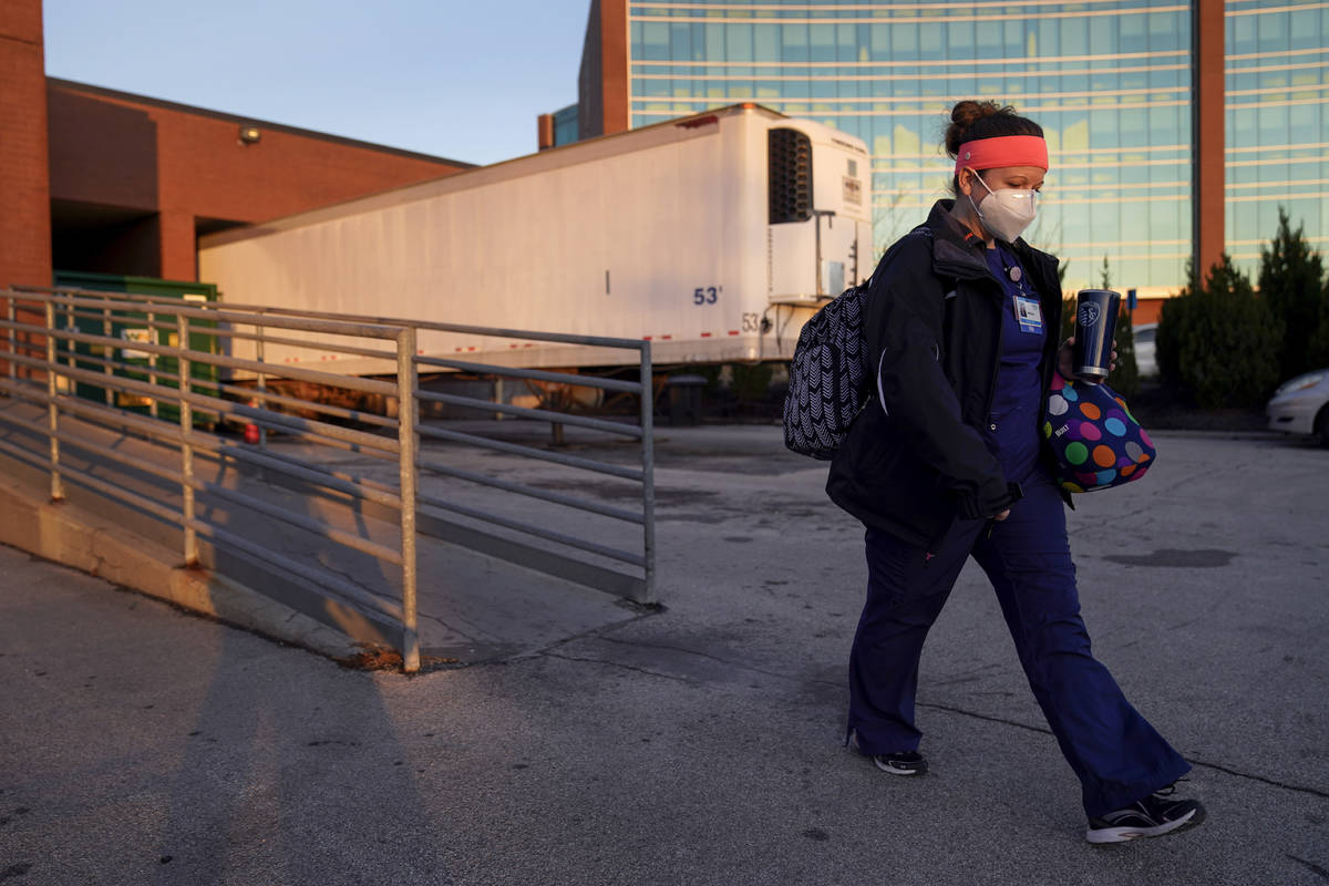 Nurse Jessica Franz leaves the Olathe Medical Center after working the graveyard shift Thursday ...
