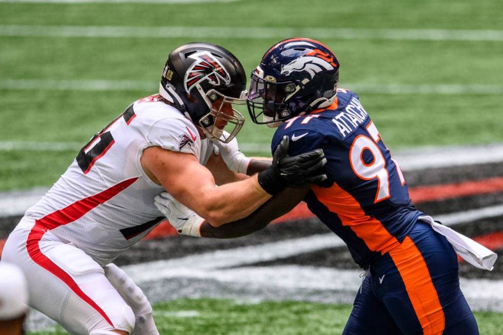 Denver Broncos outside linebacker Jeremiah Attaochu (97) works against Atlanta Falcons offensiv ...