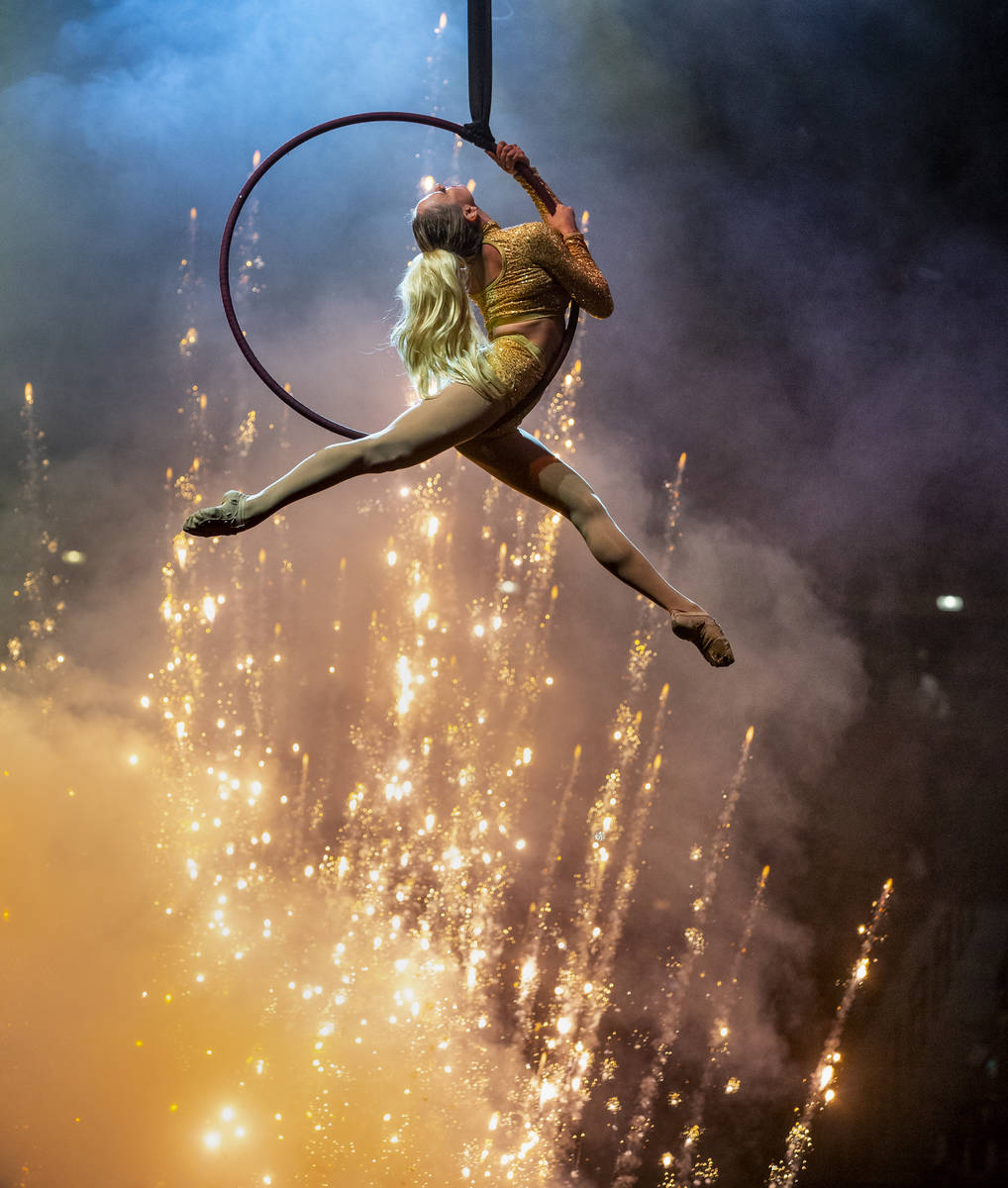 A aerobatic performer above some pyrotechnics during the tenth go round of the Wrangler Nationa ...