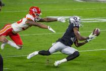 Las Vegas Raiders wide receiver Nelson Agholor (15) makes a diving attempt at a long pass as Ka ...