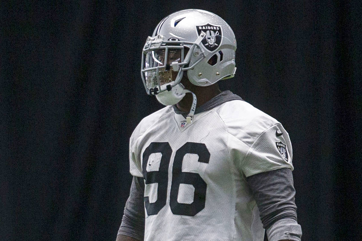 Las Vegas Raiders defensive end Clelin Ferrell (96) warms up during a practice session at the t ...