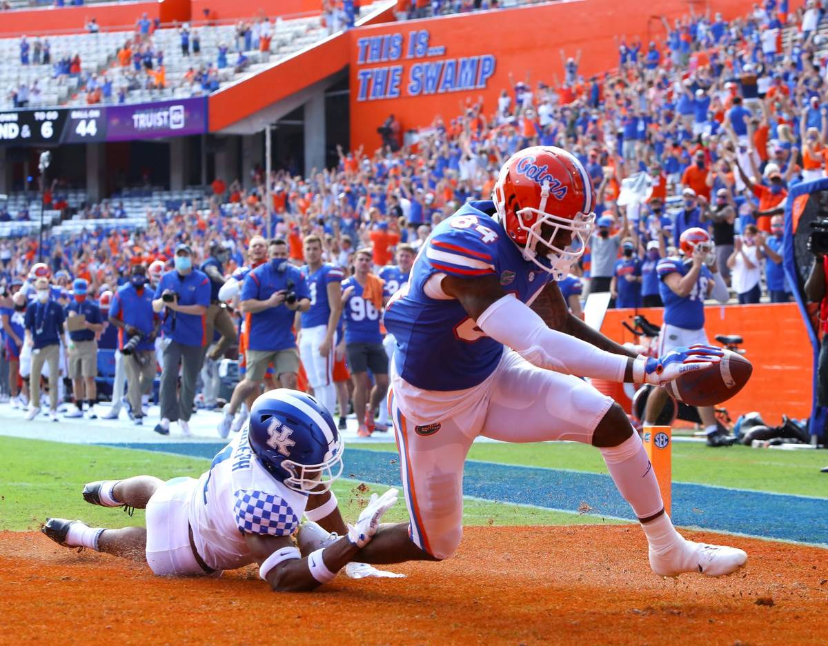 Florida tight end Kyle Pitts (84) scores a touchdown during an NCAA college football game again ...
