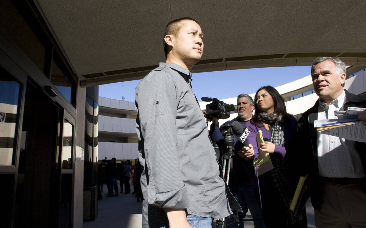 Tony Hsieh, CEO of Zappos a subsidiary of Amazon.com, takes questions as he leaves Las Vegas Ci ...