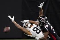 Las Vegas Raiders tight end Darren Waller (83) extends to try and make a catch over Atlanta Fal ...