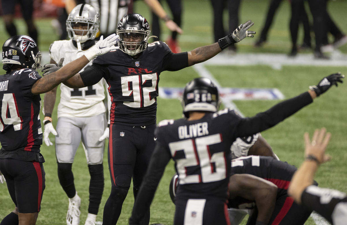 Atlanta Falcons cornerback Darqueze Dennard (34), Atlanta Falcons defensive end Charles Harris ...