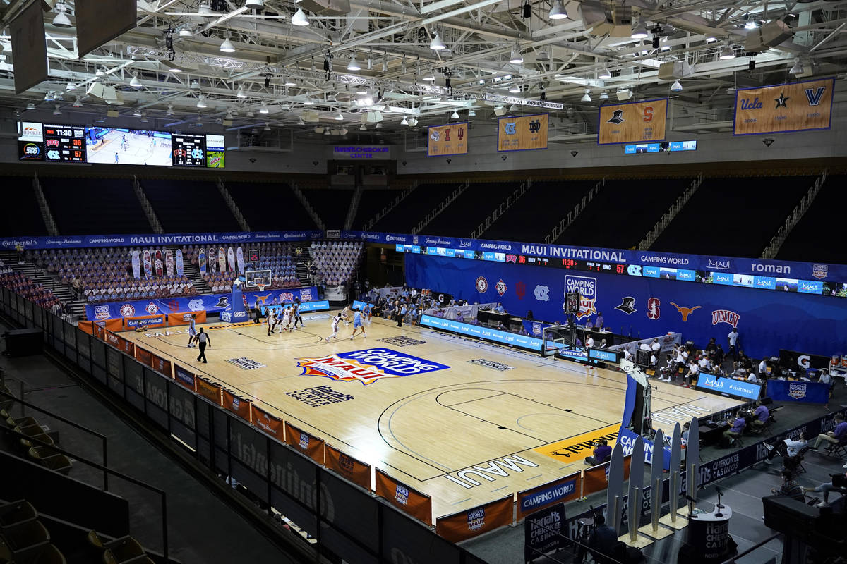 Fans are missing in the stands at Harrah's Cherokee Center during the NCAA college basketball g ...