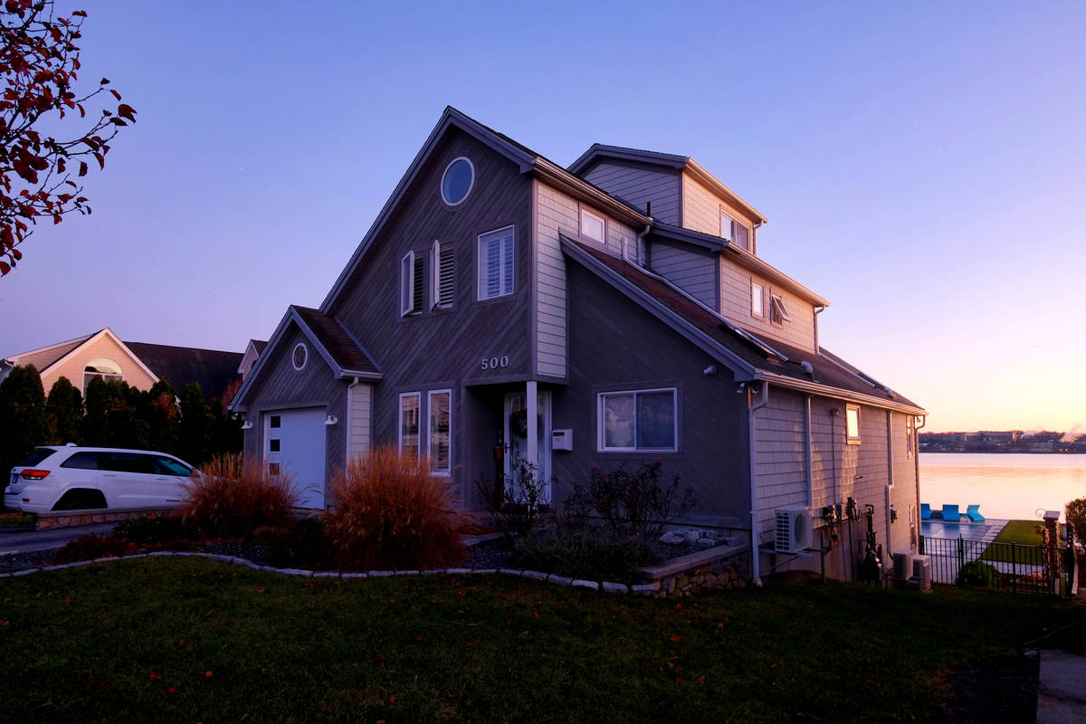 The early morning sun lights up the home at 500 Pequot Ave, along the Thames River, pictured on ...
