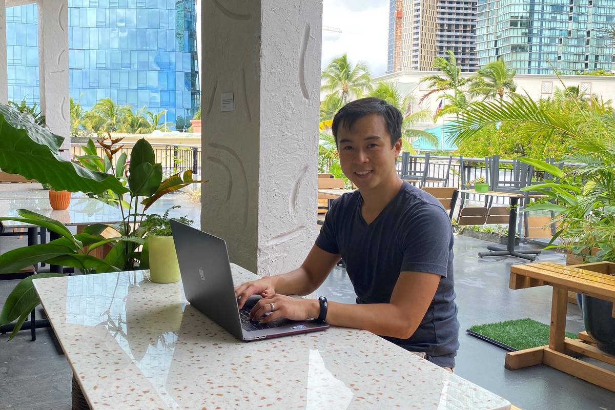 Richard Matsui works from a coworking space on Nov. 18, 2020, in Honolulu. (Ashley McCue via AP)