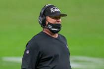 Las Vegas Raiders head coach Jon Gruden coaches from the sideline during the second quarter of ...