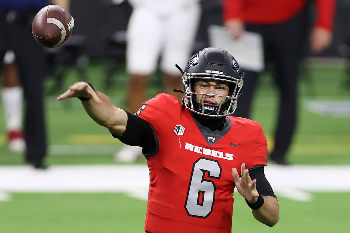 UNLV Rebels quarterback Max Gilliam (6) makes a pass against the Fresno State Bulldogs during t ...