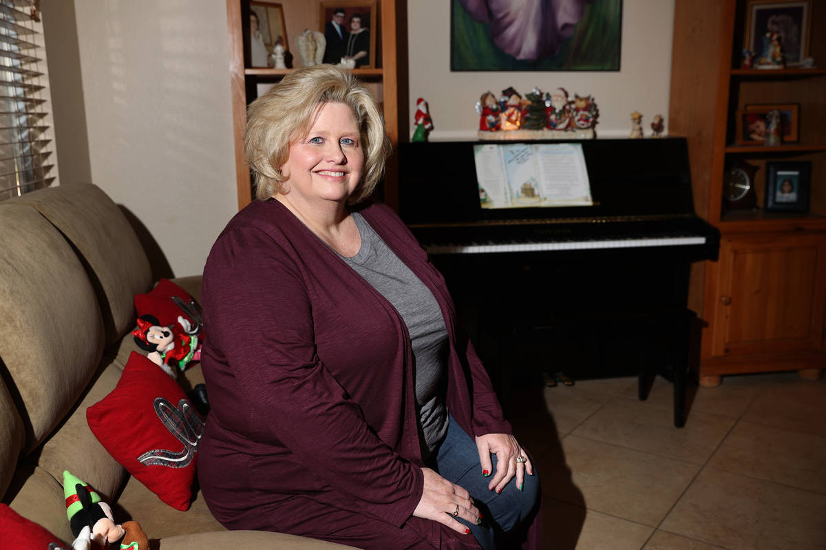 Kim Ritzer, director of choir at Green Valley High School, poses for a portrait at her home in ...