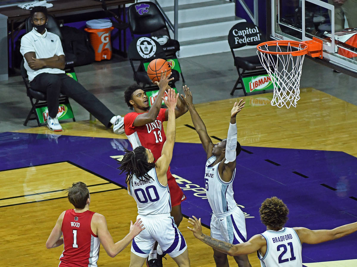 UNLV's Bryce Hamilton goes up for a shot against Kansas State at Bramlage Coliseum in Manhattan ...