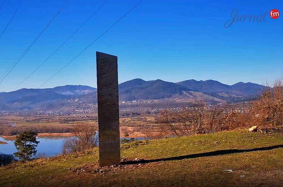 A metal monolith discovered outside of Piatra Neamț, Romania, over the weekend. It is similar ...